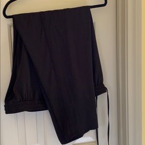 Straight leg black pants.